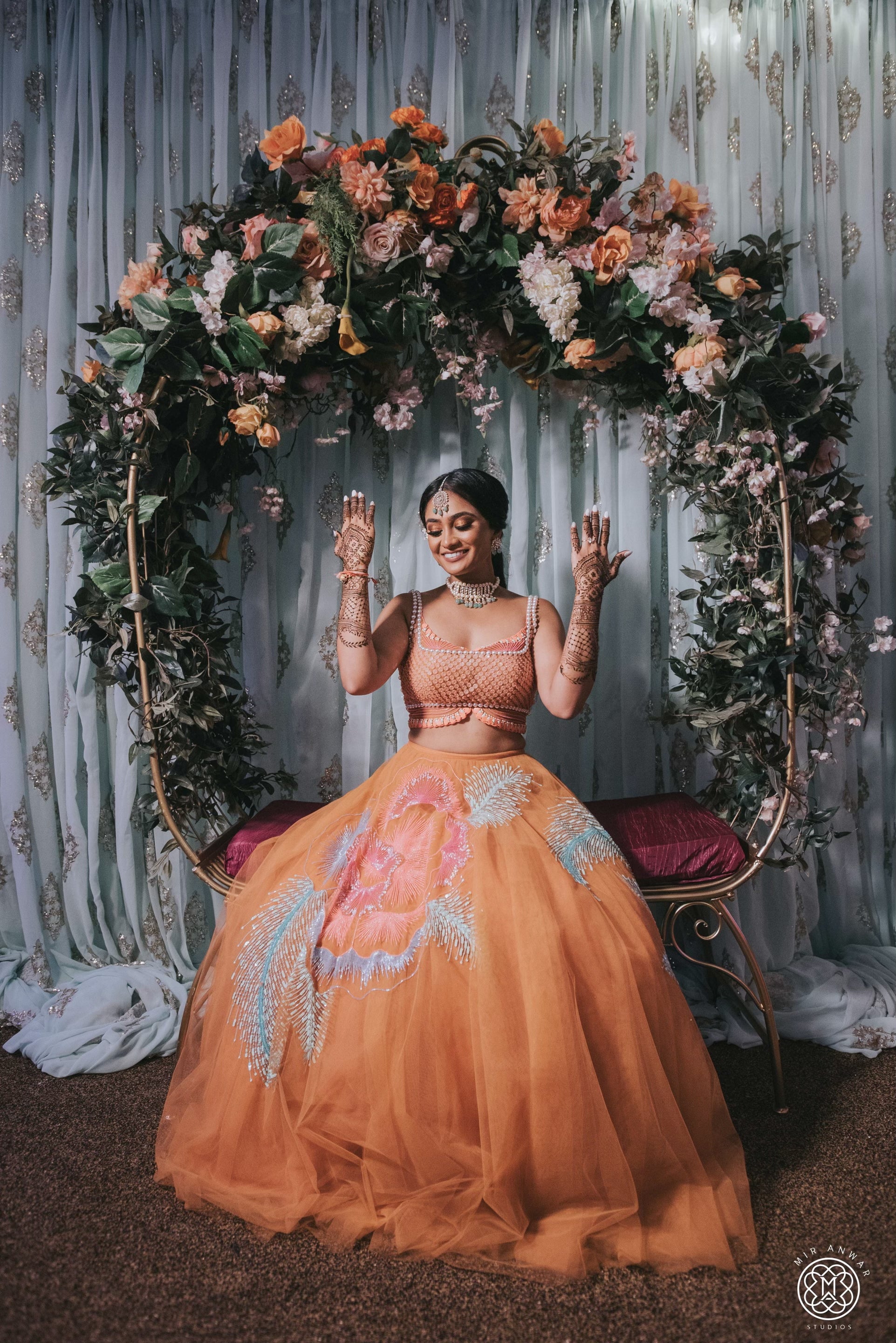 The Perfect Mehndi Moment in the Bradshaw Lehenga