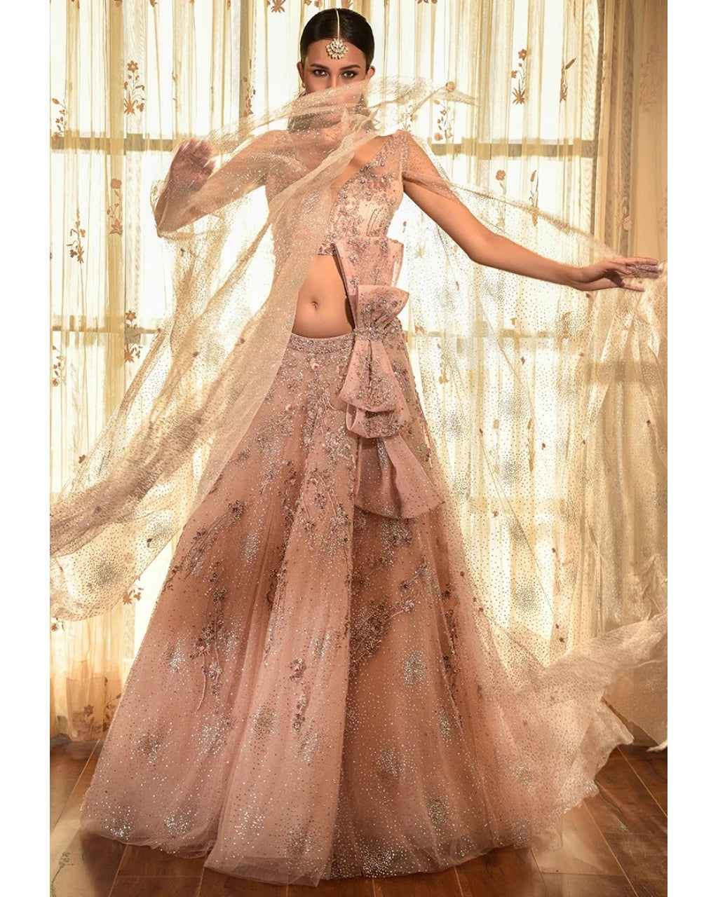 Sea Shell Tulle Lehenga Set With Extended Sleeves.