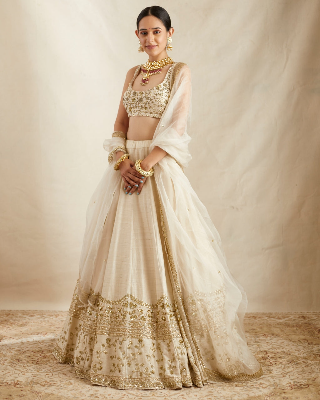 Off White With Gold Work Lehenga Set