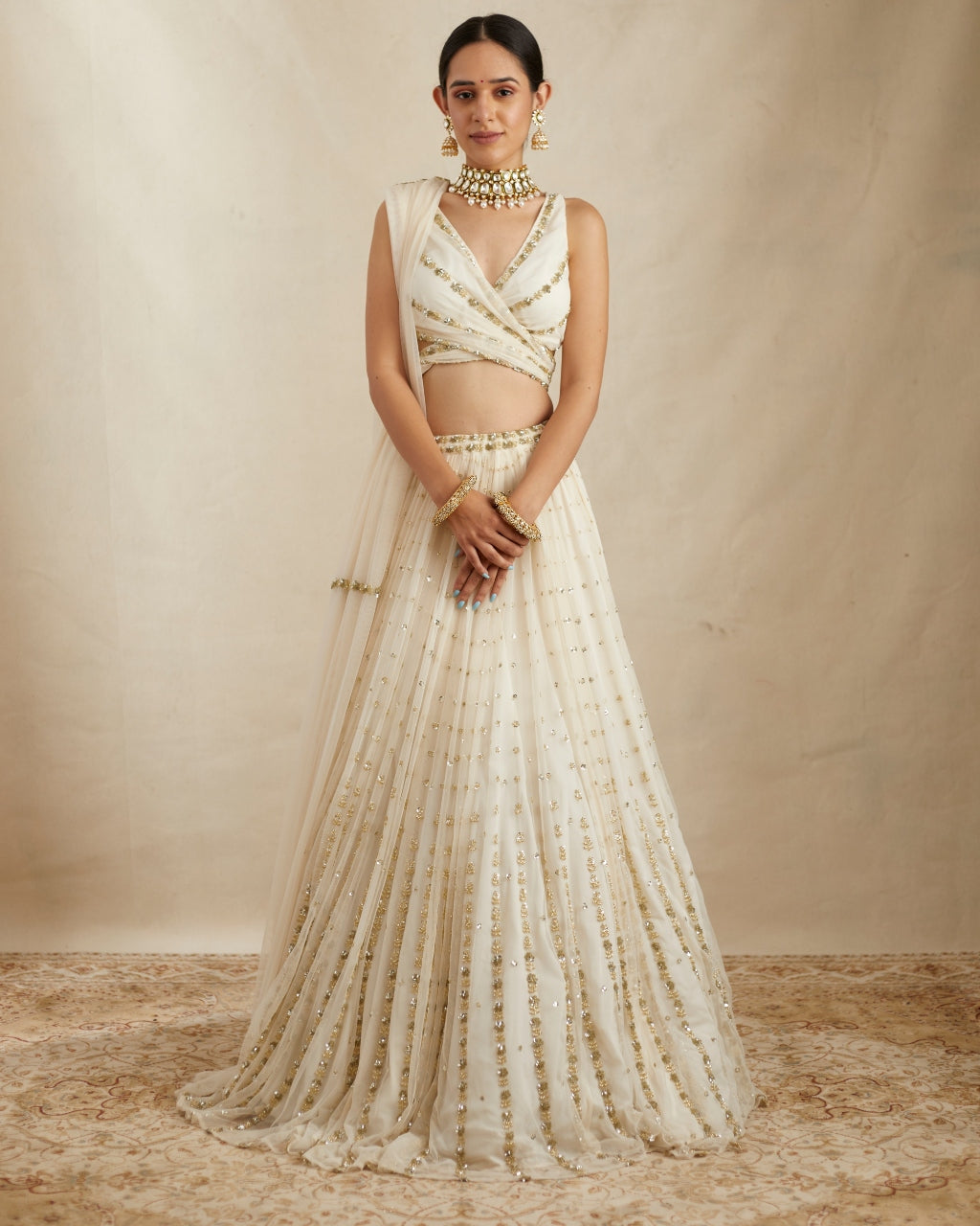 Off White Net Crepe Embroidered Lehenga Set