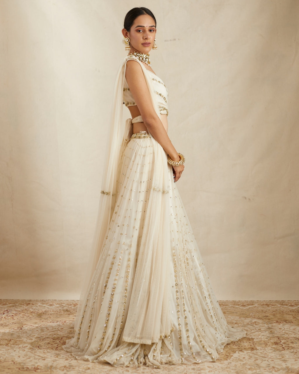 Off White Net Crepe Embroidered Lehenga Set