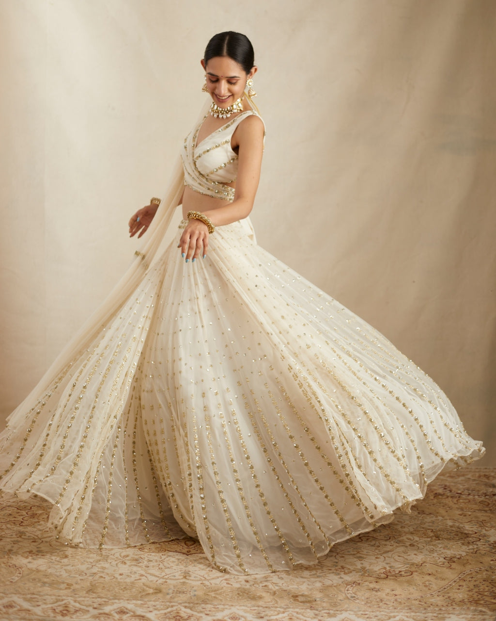 Off White Net Crepe Embroidered Lehenga Set