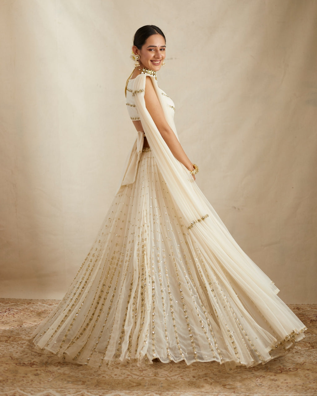 Off White Net Crepe Embroidered Lehenga Set