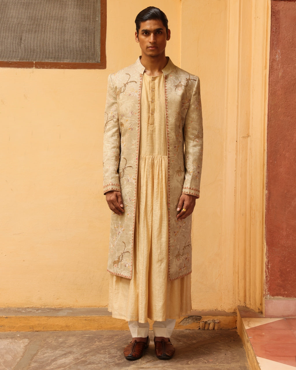 Ivory Silk Embroidered Sherwani Set.
