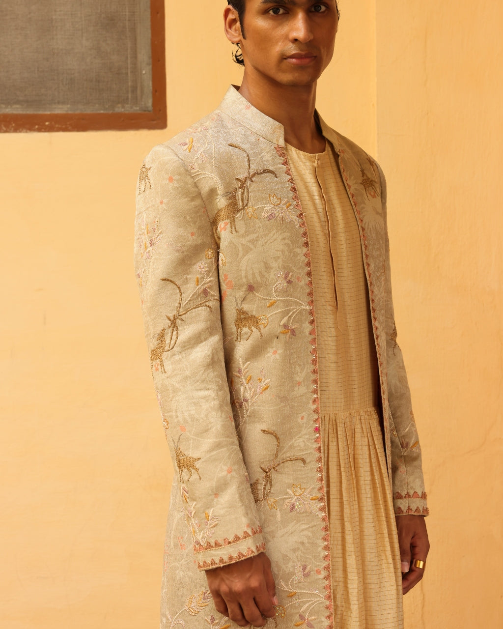 Ivory Silk Embroidered Sherwani Set.