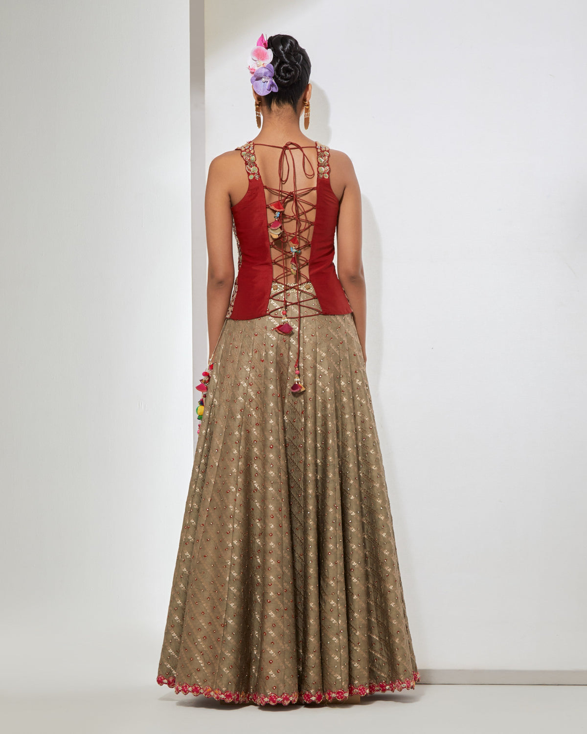 Maroon Peplum Corset & Bandhani Lehenga