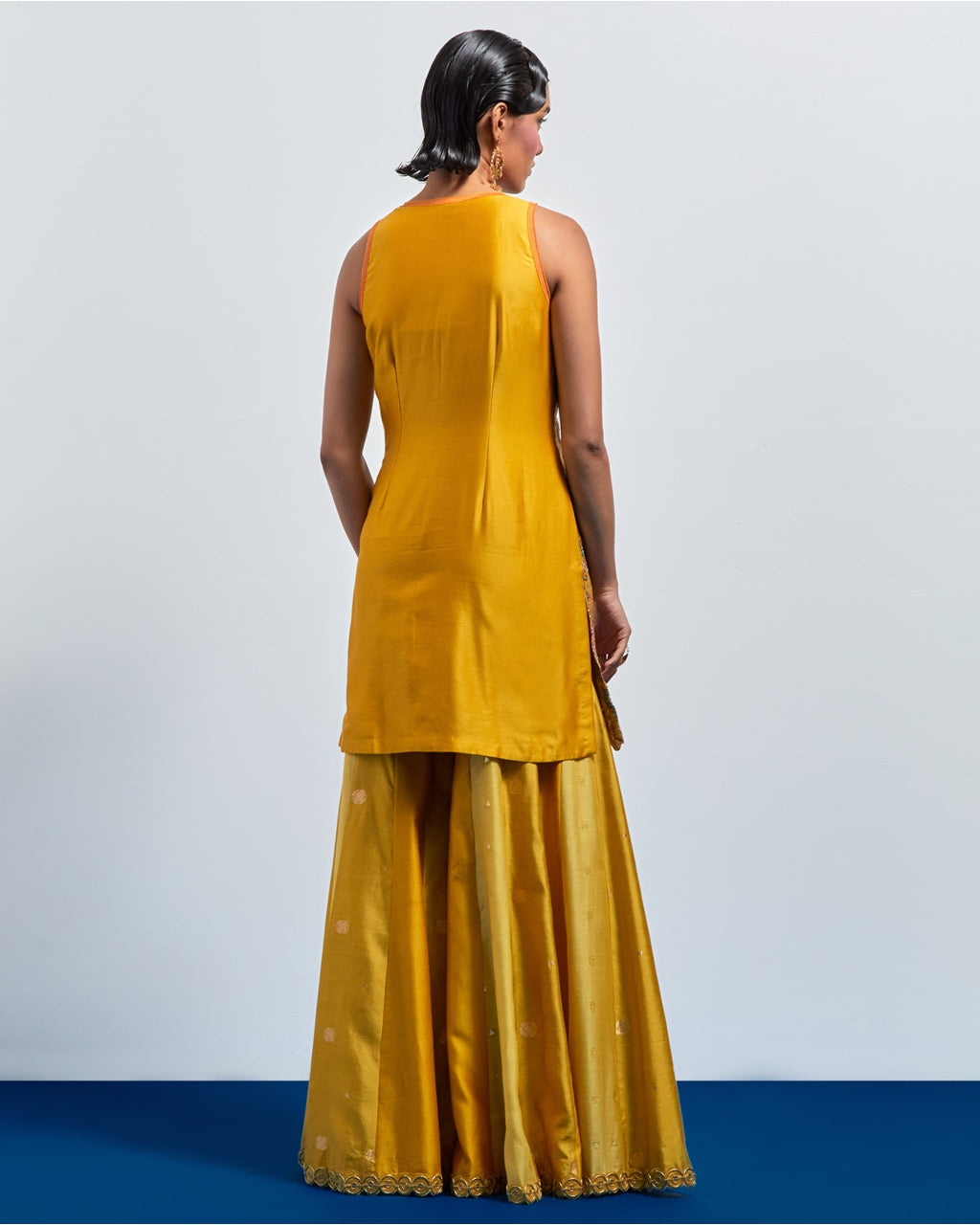 Mustard Yellow Embroidered Peplum Sharara Set
