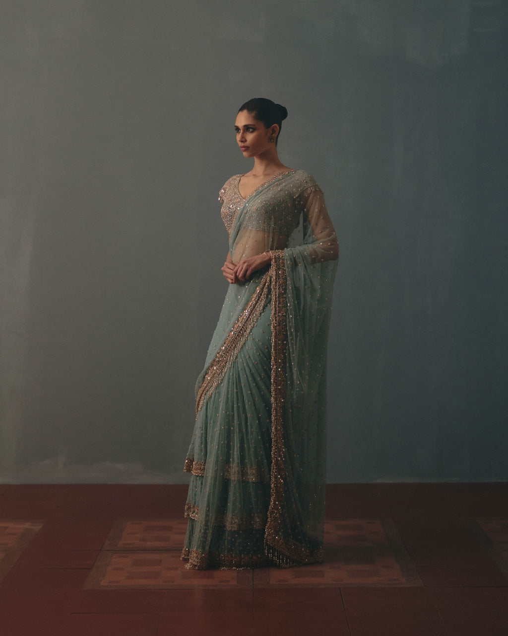 Polar Sky And Rose Gold Hand Embroidered Net Sari And Short Sleeves  Blouse