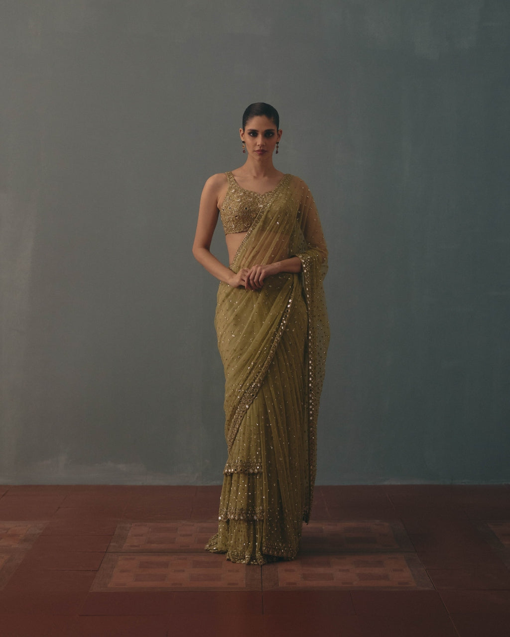 Sage Green And Pani Gold Hand Embroidered Net Sari And Sleeveless  Blouse