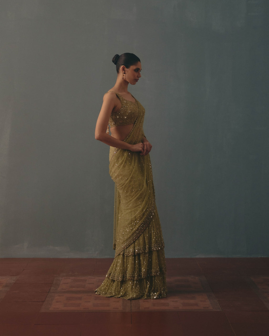 Sage Green And Pani Gold Hand Embroidered Net Sari And Sleeveless  Blouse