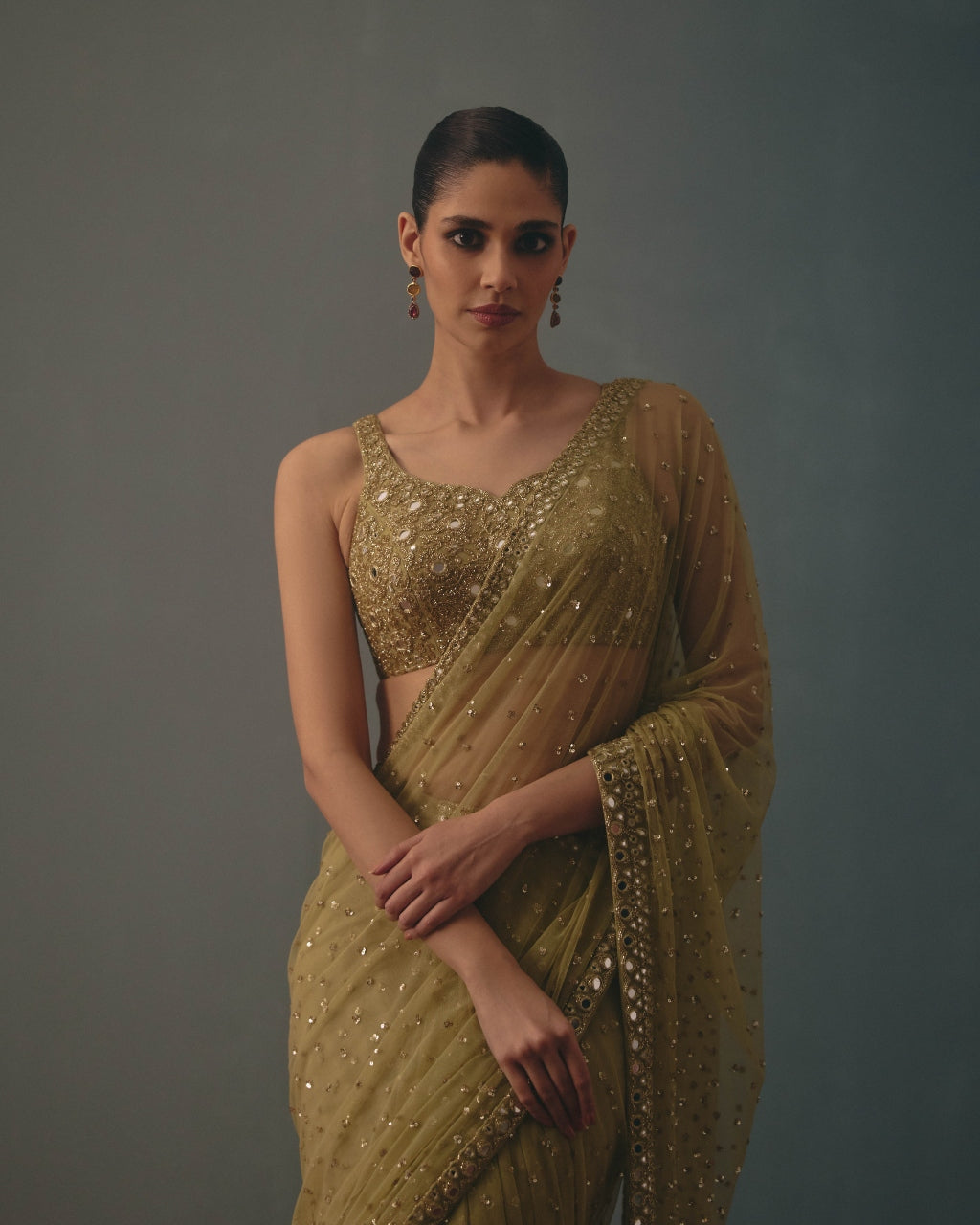 Sage Green And Pani Gold Hand Embroidered Net Sari And Sleeveless  Blouse