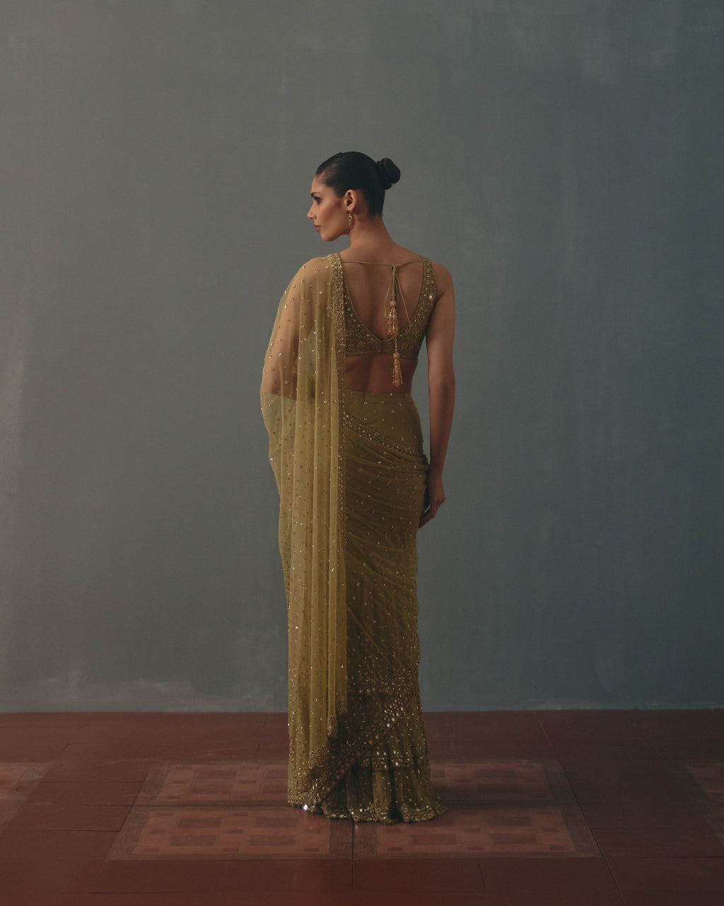Sage Green And Pani Gold Hand Embroidered Net Sari And Sleeveless  Blouse