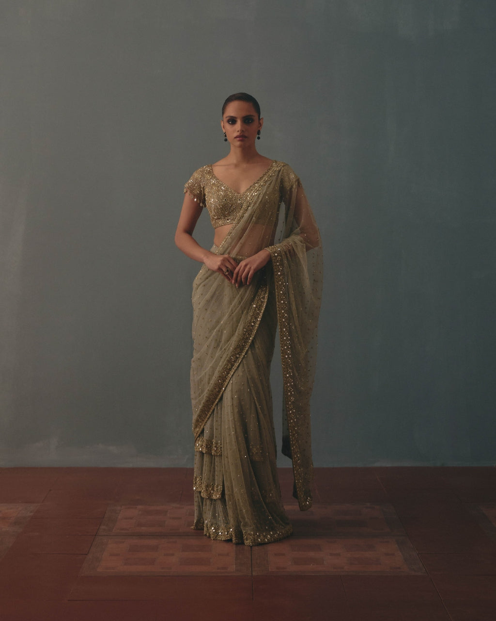 Mint Green And Pani Gold Hand Embroidered Net Sari And Short Sleeves  Blouse