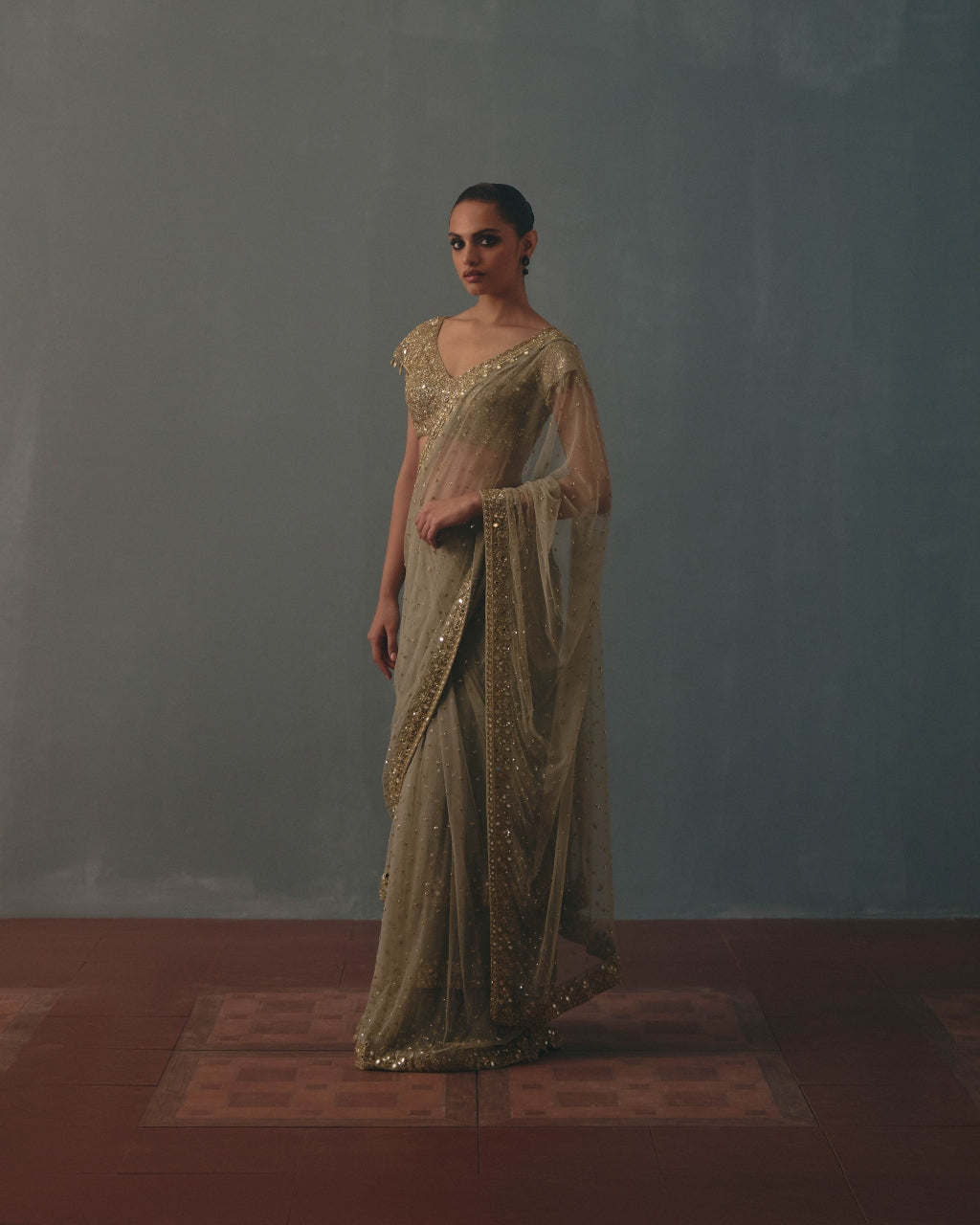 Mint Green And Pani Gold Hand Embroidered Net Sari And Short Sleeves  Blouse