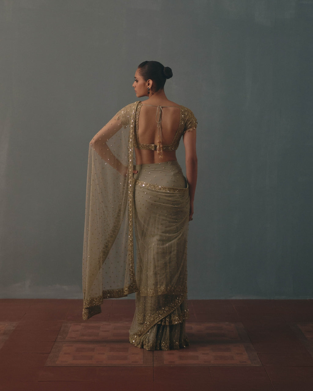 Mint Green And Pani Gold Hand Embroidered Net Sari And Short Sleeves  Blouse
