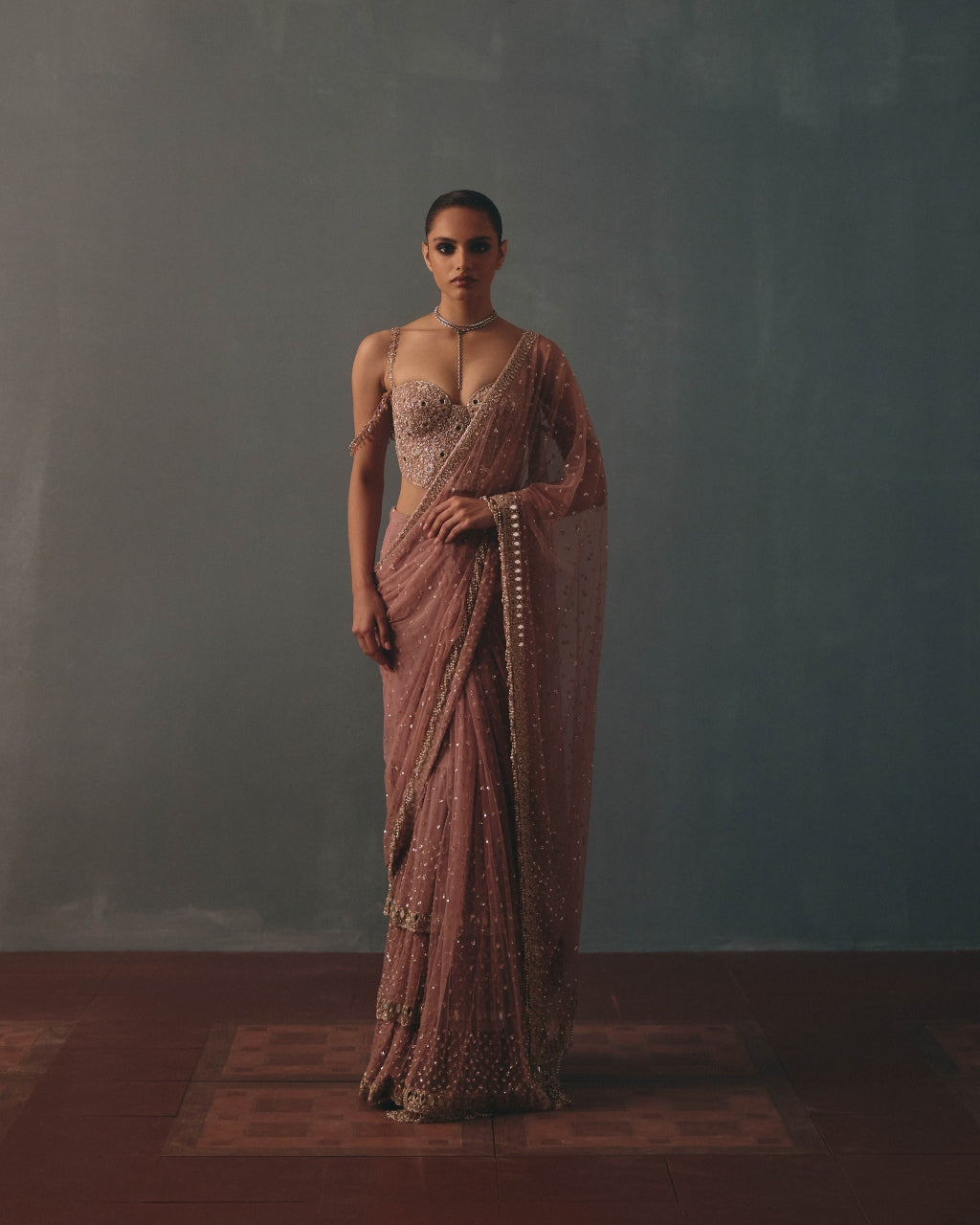 Mauve & Rose Gold Hand Embroidered Net & Mirror Corset & Net Ruffle Sari Set