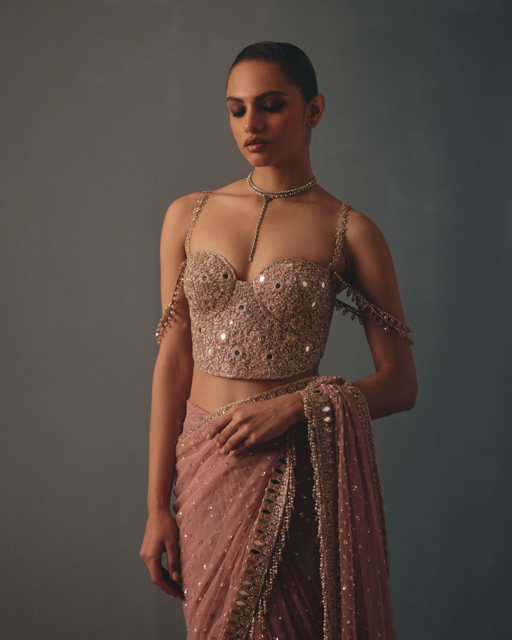 Mauve & Rose Gold Hand Embroidered Net & Mirror Corset & Net Ruffle Sari Set