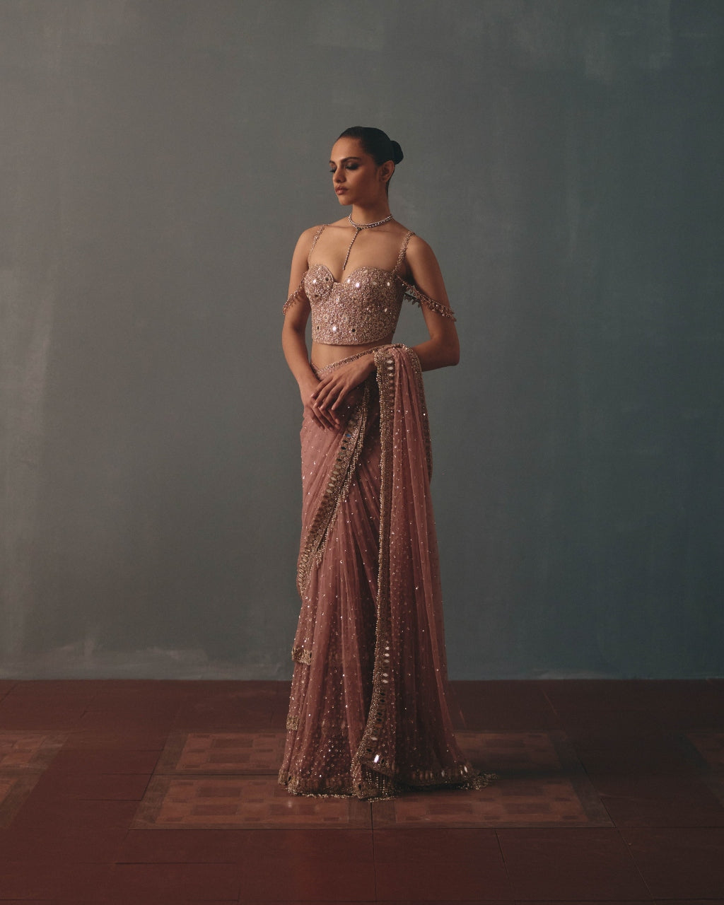 Mauve & Rose Gold Hand Embroidered Net & Mirror Corset & Net Ruffle Sari Set