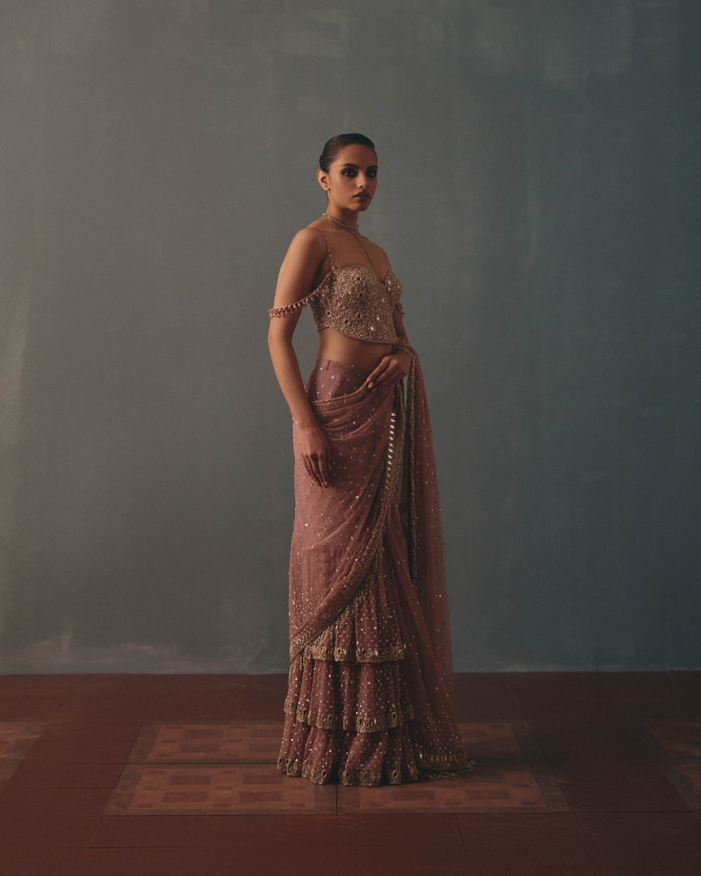 Mauve & Rose Gold Hand Embroidered Net & Mirror Corset & Net Ruffle Sari Set