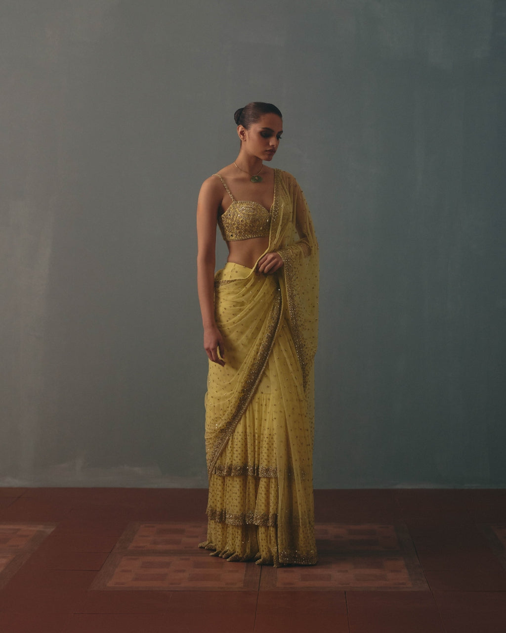 Butter Yellow And Pani Gold Hand Embroidered Net & Mirror Blouse & Net Ruffle Sari Set