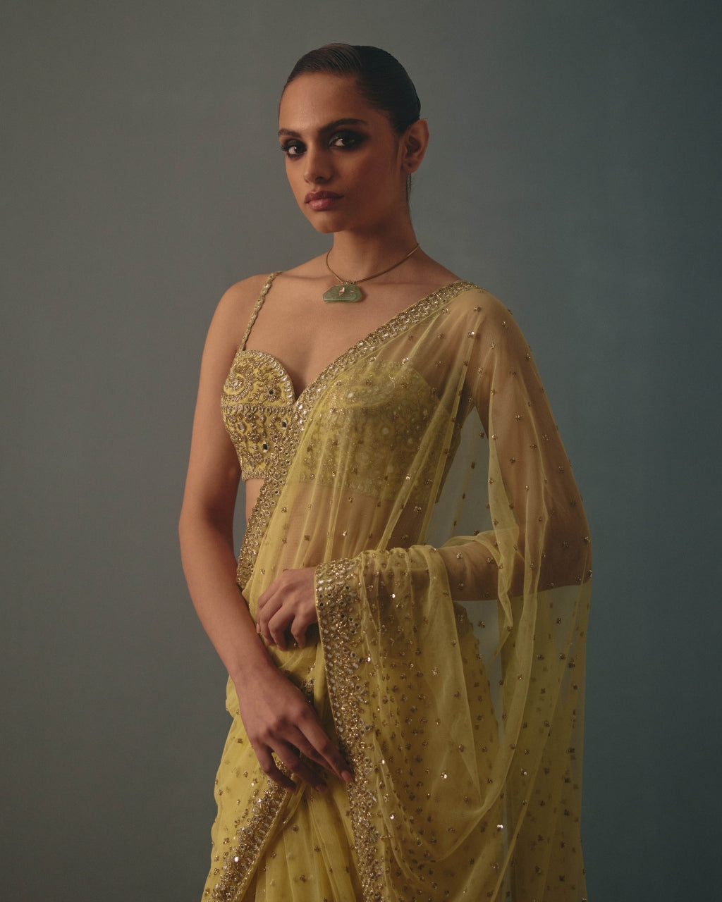 Butter Yellow And Pani Gold Hand Embroidered Net & Mirror Blouse & Net Ruffle Sari Set