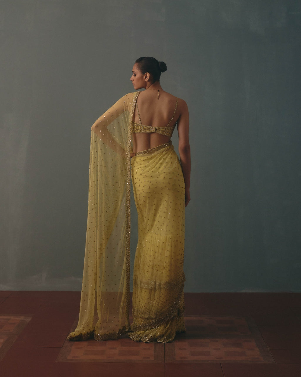 Butter Yellow And Pani Gold Hand Embroidered Net & Mirror Blouse & Net Ruffle Sari Set