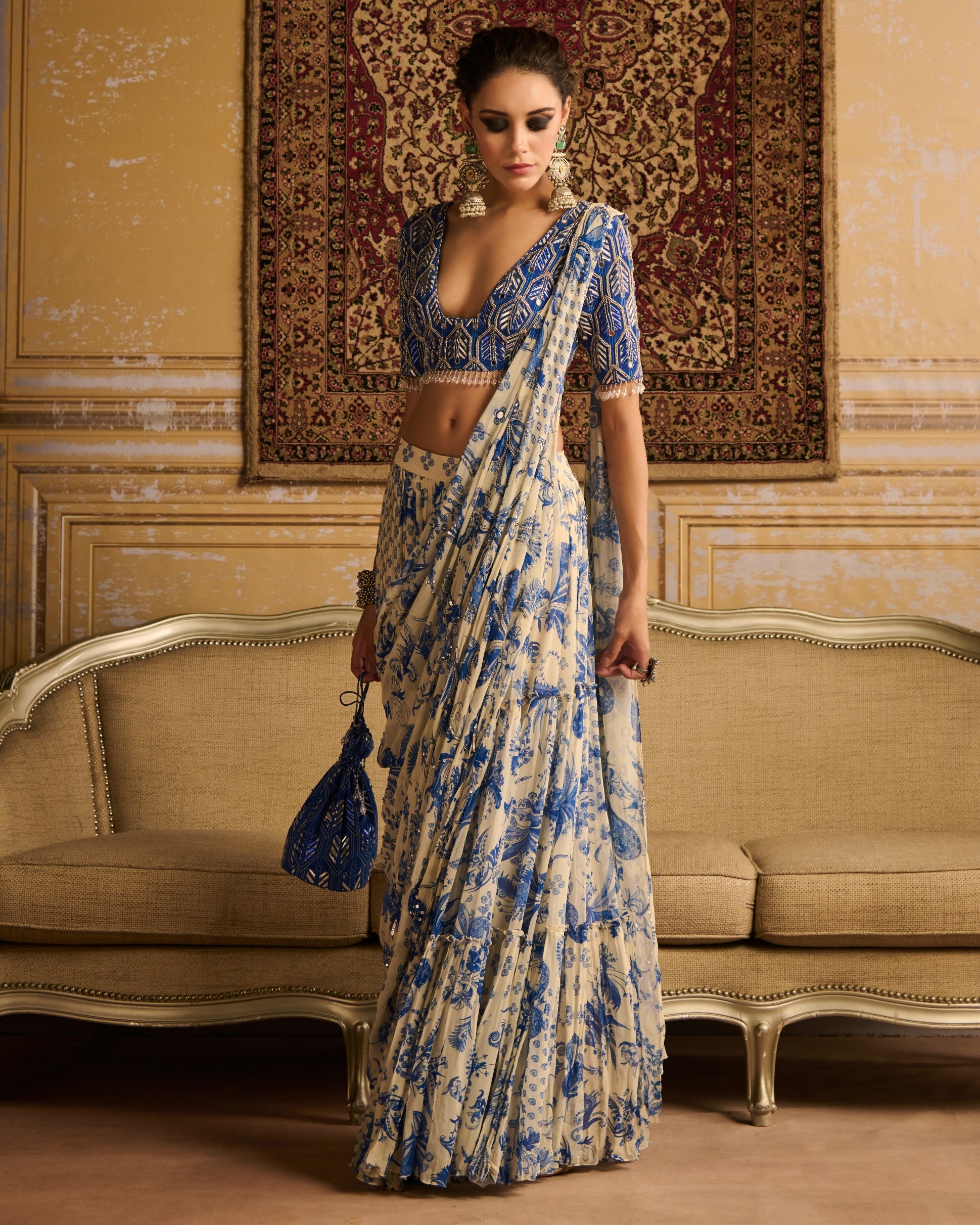 Blue Highlighted Blouse And Tiered Sari Set