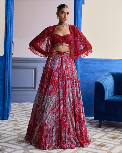 Red Embroidered Blouse With Tassel Cape Jacket & Floral Lehenga Set