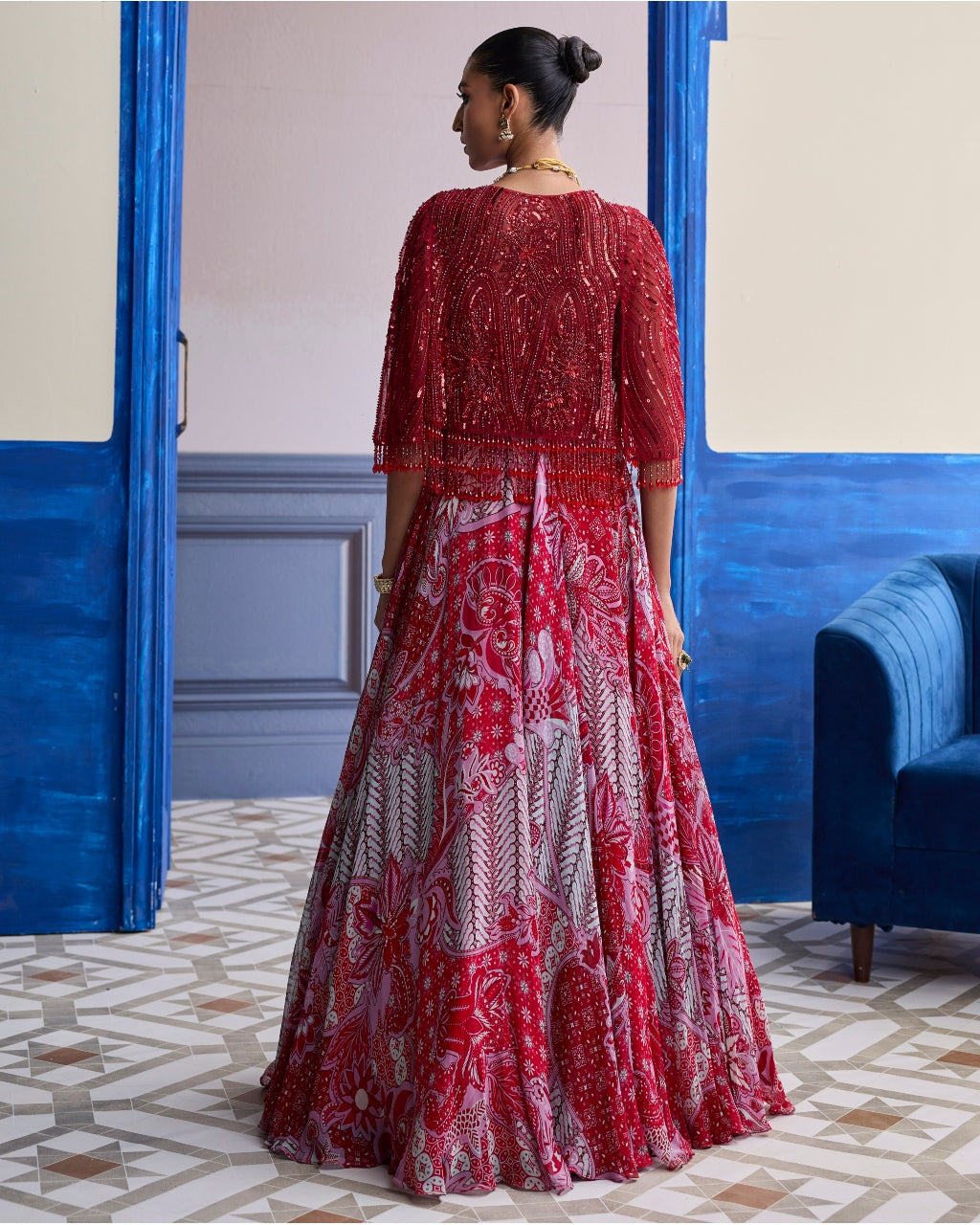 Red Embroidered Blouse With Tassel Cape Jacket & Floral Lehenga Set