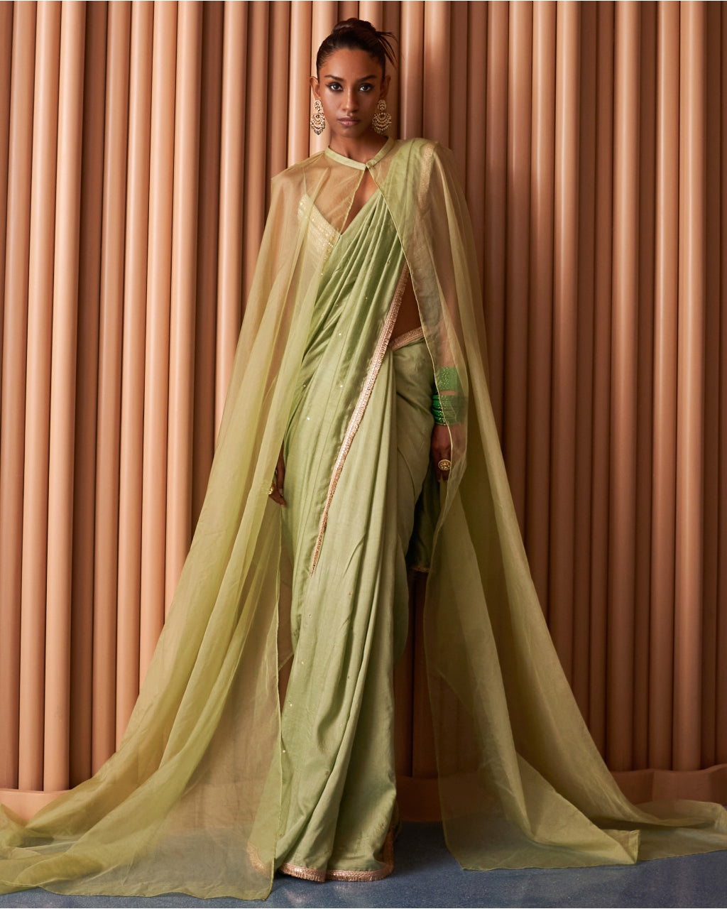 Shreen Green Sari With A Cape
