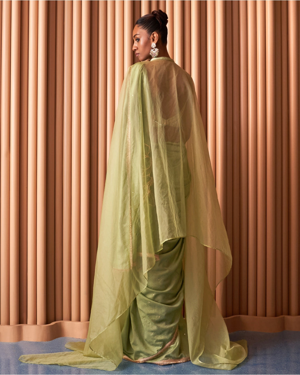 Shreen Green Sari With A Cape