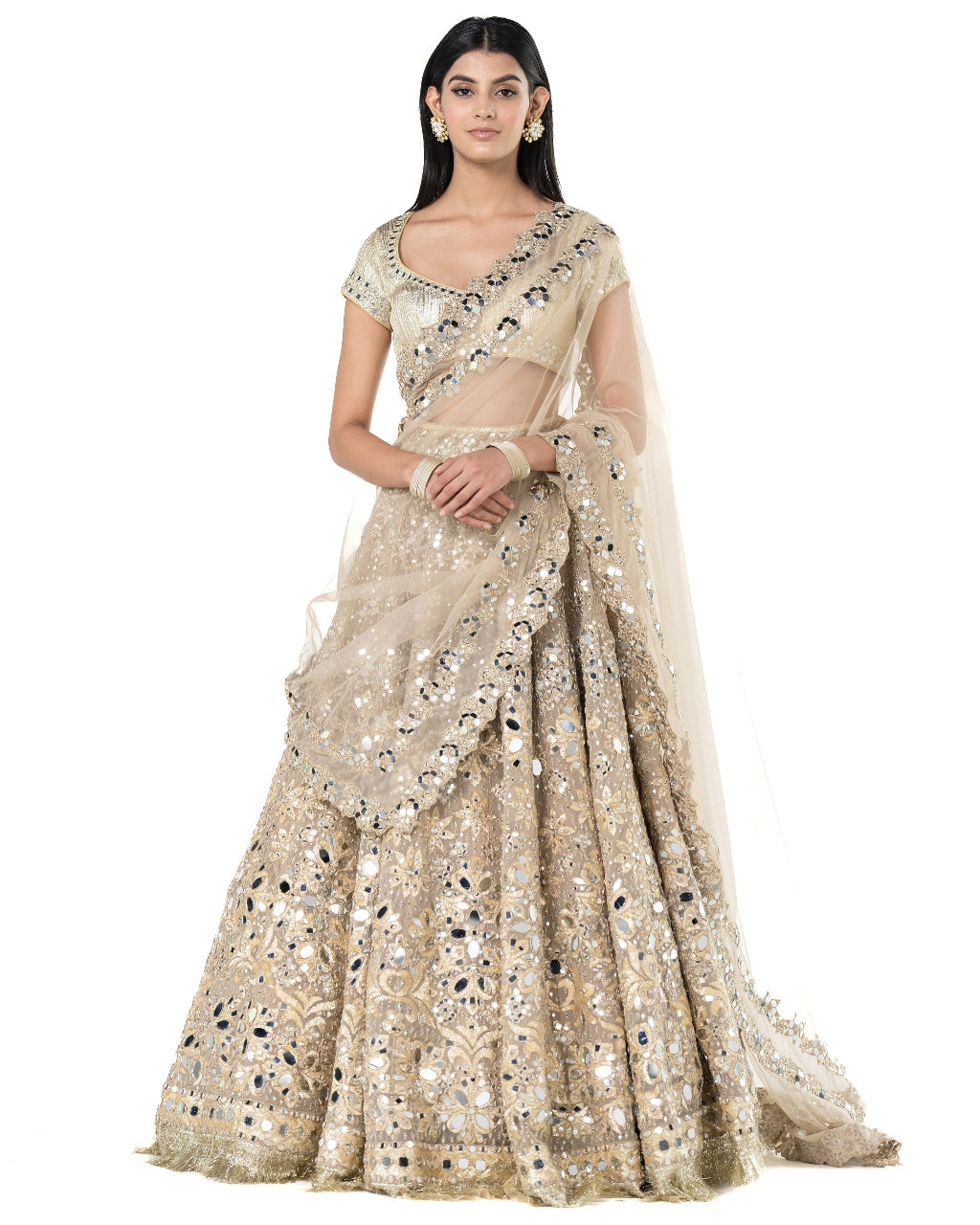 Beige Heavily Embellished Golden Lehenga Set