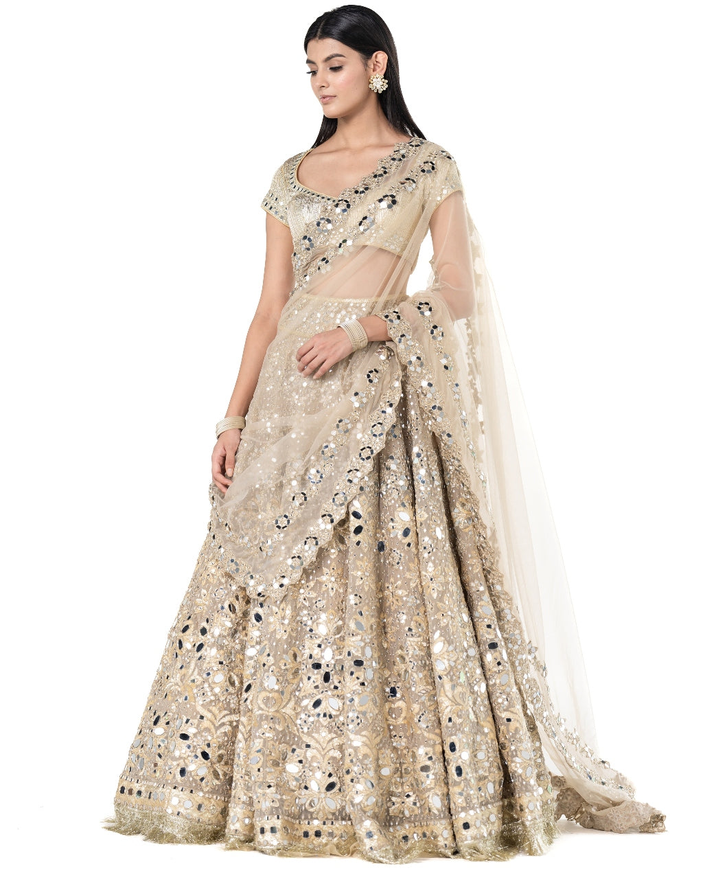 Beige Heavily Embellished Golden Lehenga Set