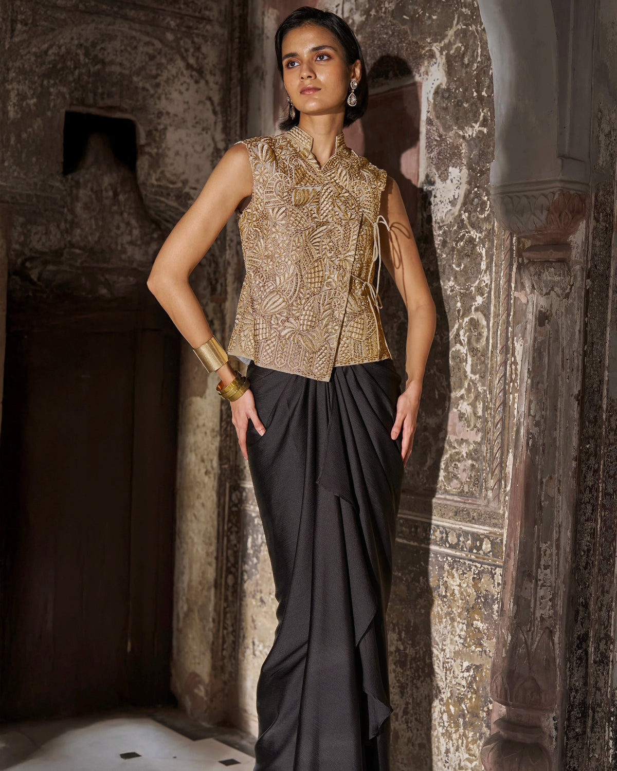 Embroidered Sleeveless Top and Black Draped Skirt