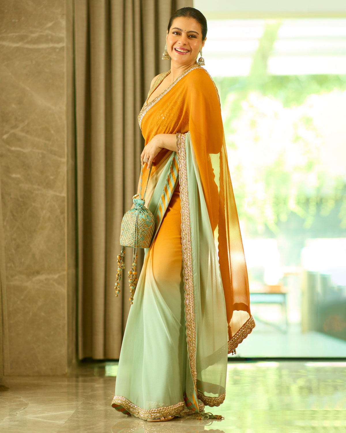 Kajol Devgan in Mustard and Sage Sari Set