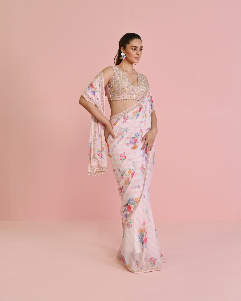 Image may contain: 1 person, standing | Elegant saree, Organza saree, Saree  designs