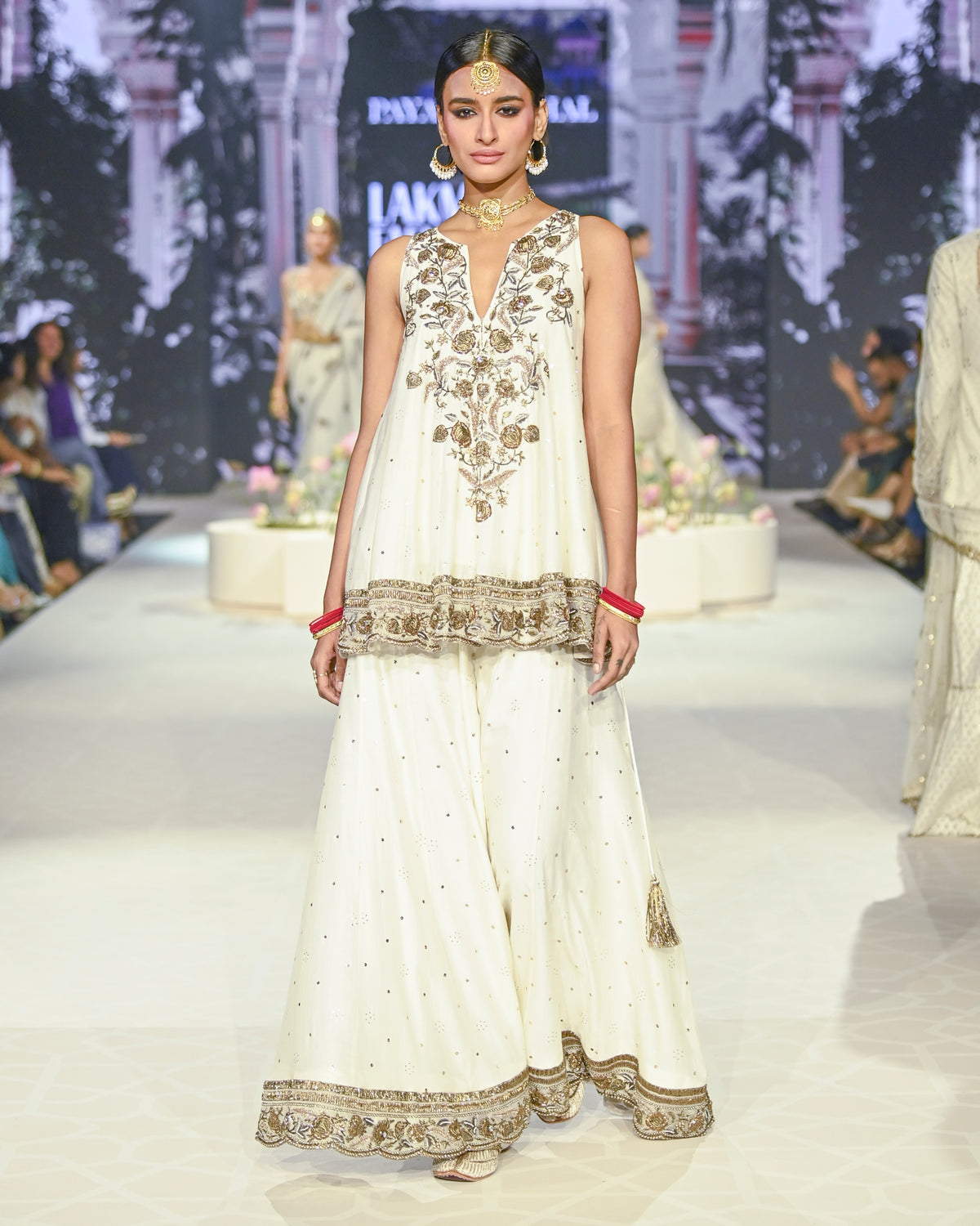 Jahanana Off White Embroidered Short Anarkali With Sharara And Dupatta Set