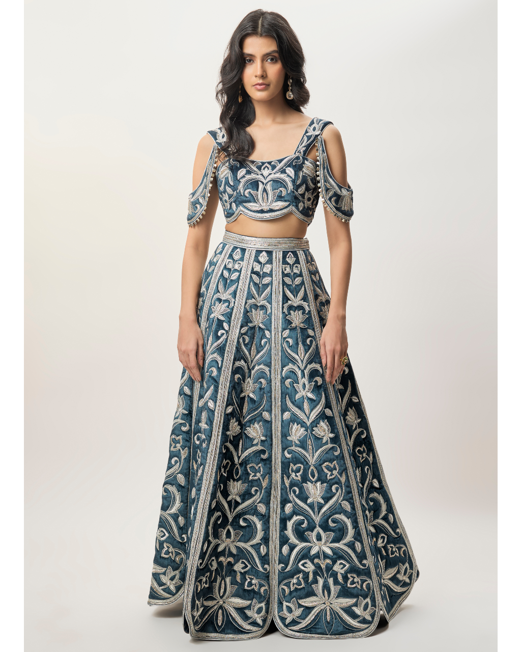 Sahar Navy Blue Velvet Quilted Embroidered Choli With Attached Embroidered Bajuband And Quilted Lehenga.