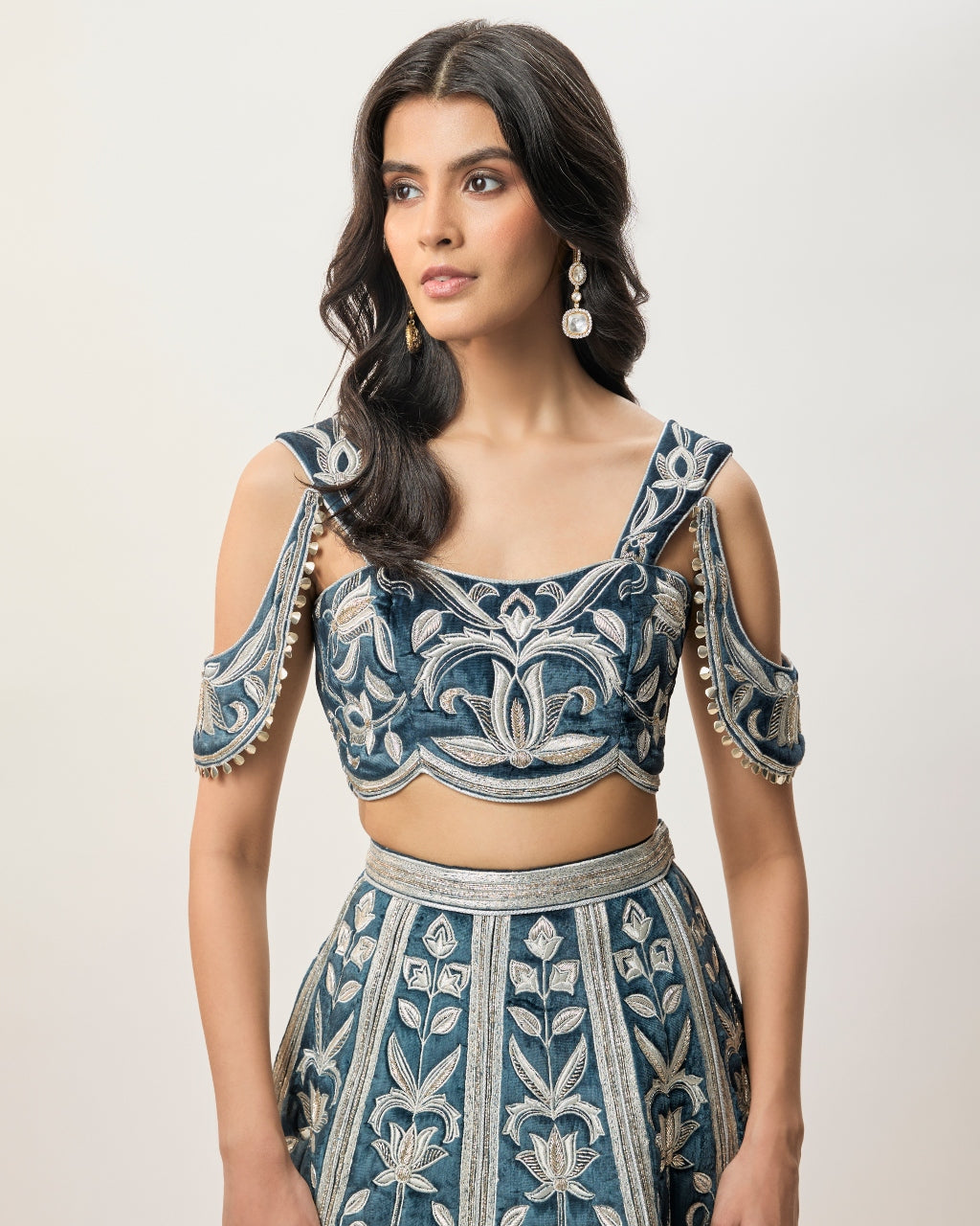 Sahar Navy Blue Velvet Quilted Embroidered Choli With Attached Embroidered Bajuband And Quilted Lehenga.
