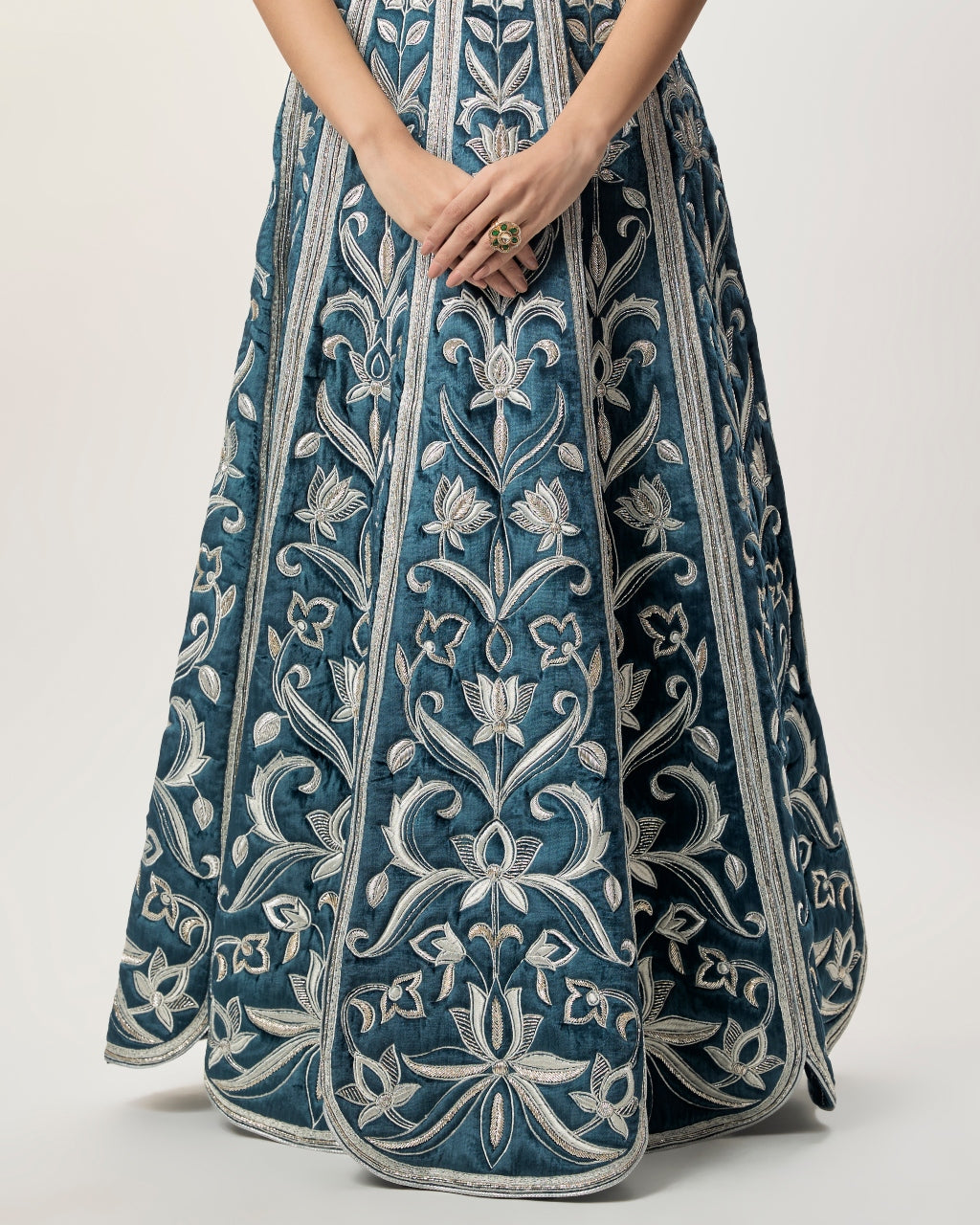 Sahar Navy Blue Velvet Quilted Embroidered Choli With Attached Embroidered Bajuband And Quilted Lehenga.