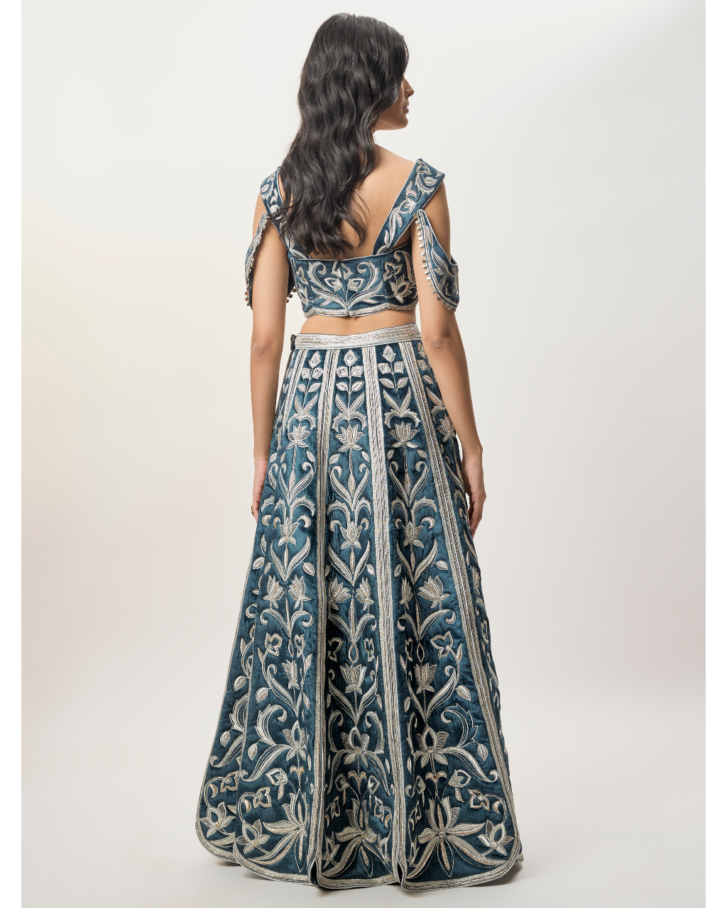 Sahar Navy Blue Velvet Quilted Embroidered Choli With Attached Embroidered Bajuband And Quilted Lehenga.