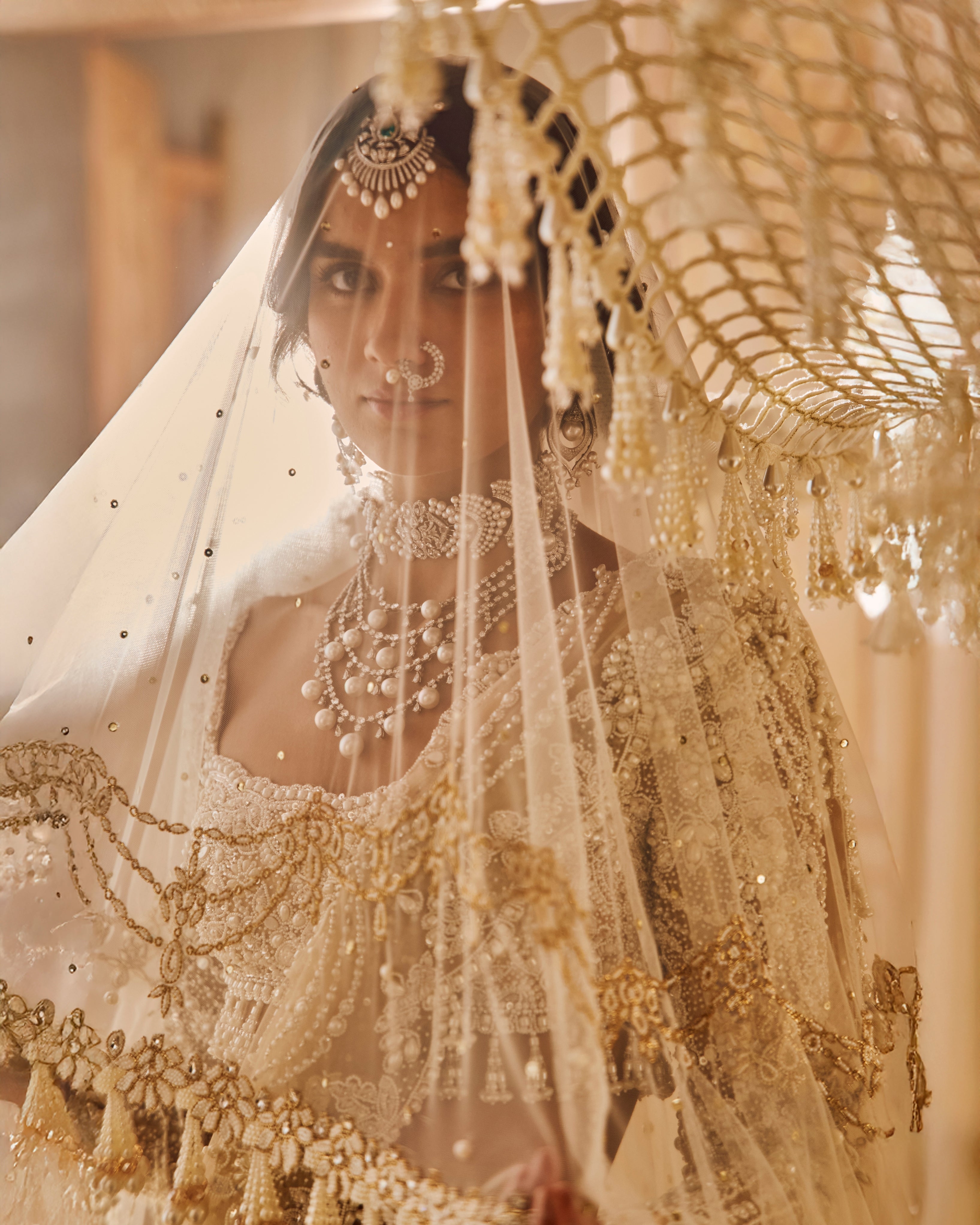 Nude Heavily Embroidered Bridal Pearl Lehenga Set