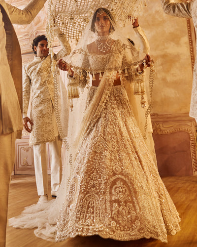Nude Heavily Embroidered Bridal Pearl Lehenga Set