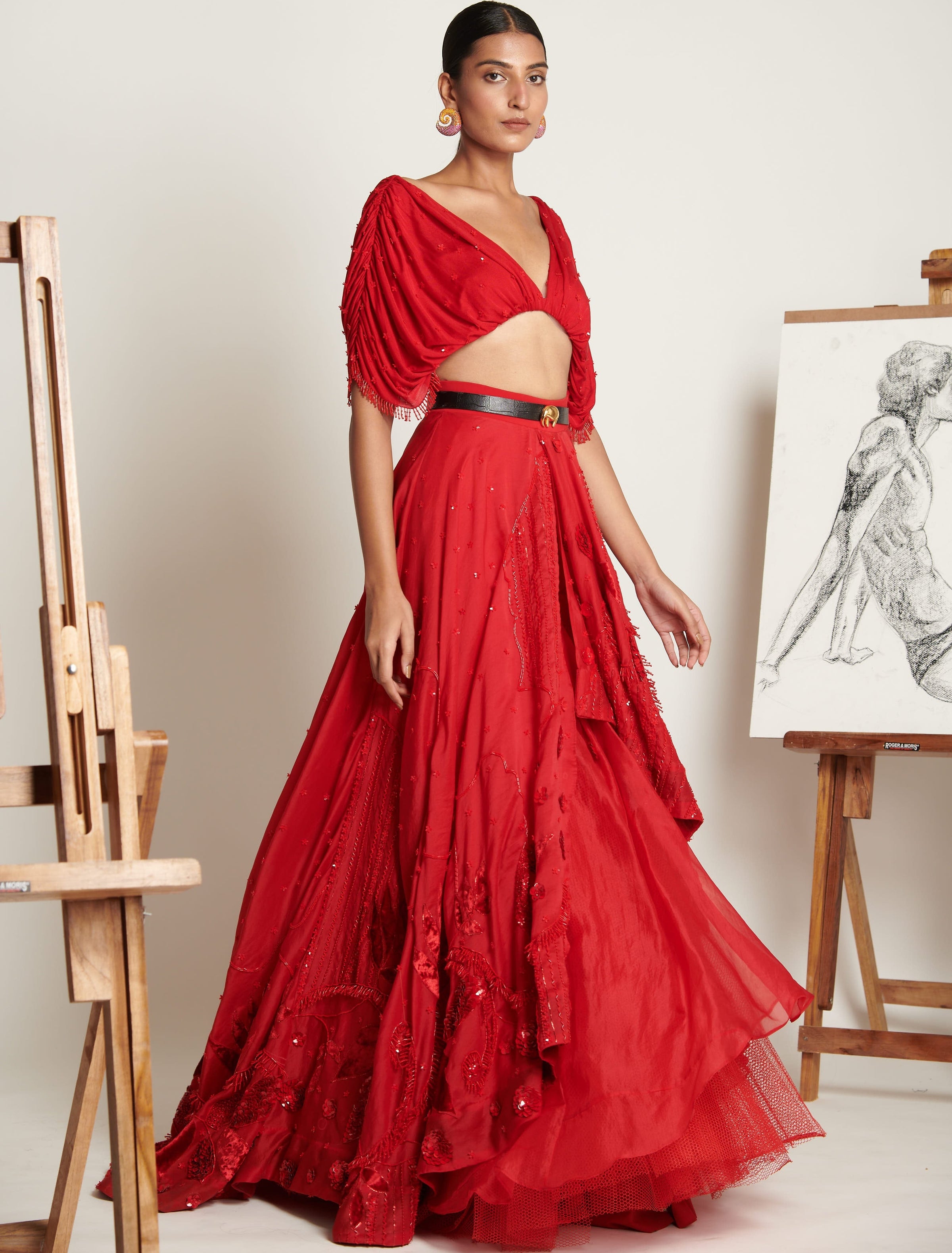 Ruby-Red Celestial Asymmetrical Lehenga With Ruched Tassel Blouse
