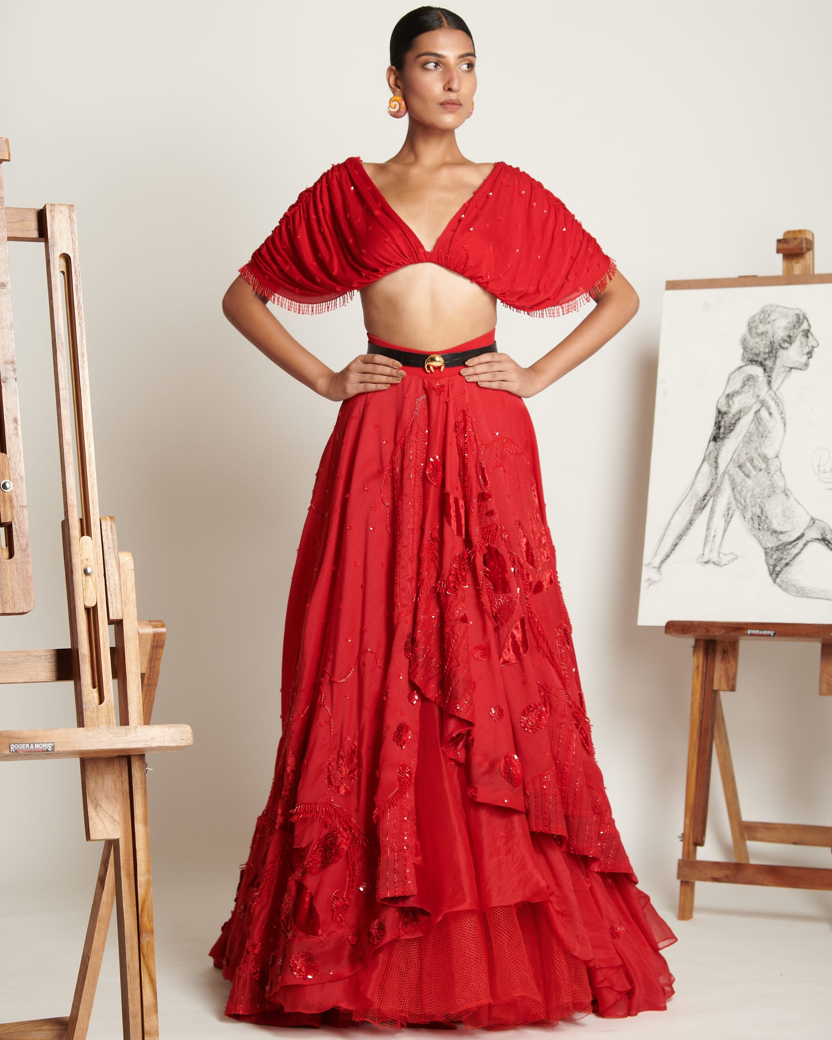 Ruby-Red Celestial Asymmetrical Lehenga With Ruched Tassel Blouse