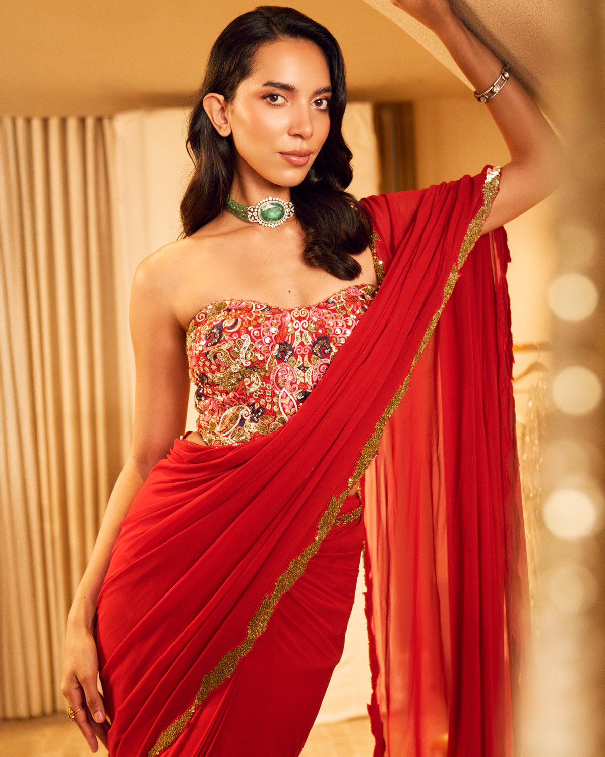 Azra Red Pre Draped Sari Set With A Corset Blouse