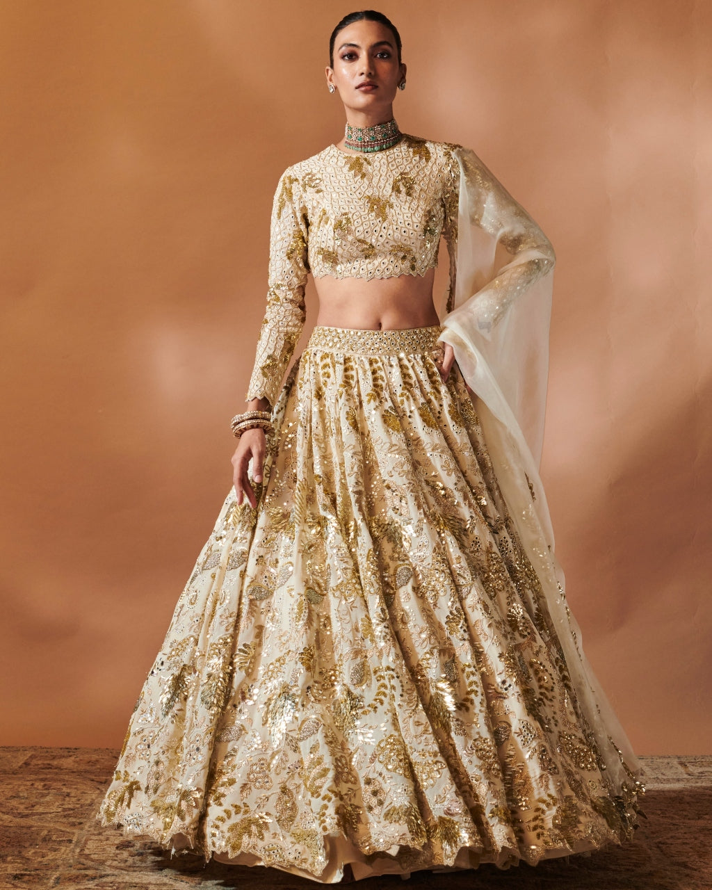 Ivory And Gold Heavily Embroidered Lehenga Set