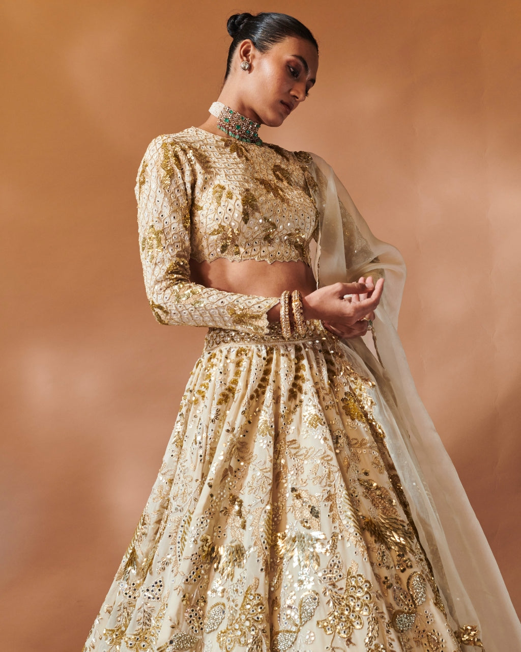 Ivory And Gold Heavily Embroidered Lehenga Set