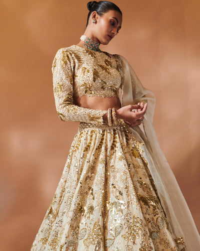 Azra Ivory And Gold Heavily Embroidered Lehenga Set