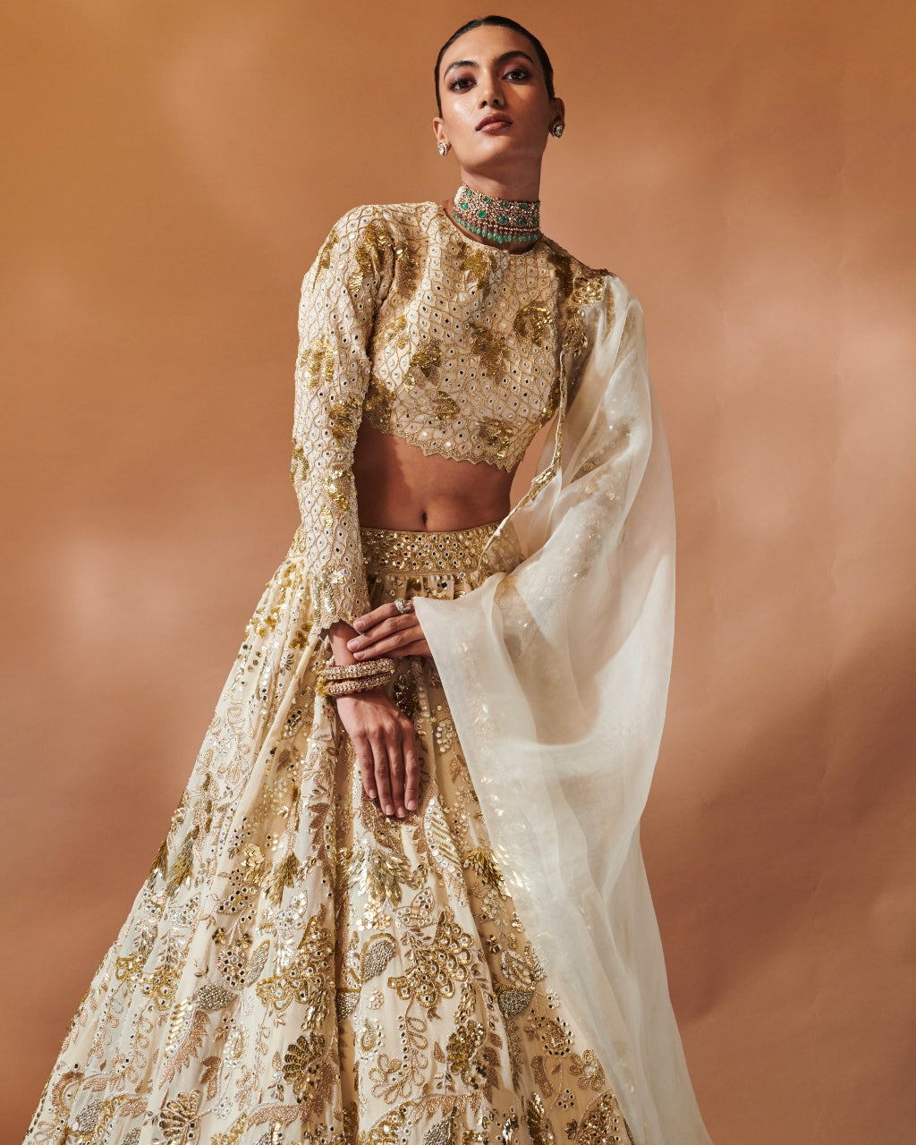 Ivory And Gold Heavily Embroidered Lehenga Set